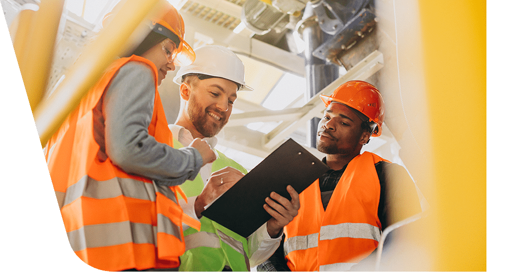 Construction workers reviewing a document